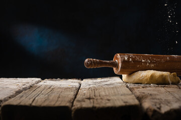 Wooden rolling pin and dough Baking and cooking dough Pizza bread Advertising banner Food preparation