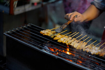 Pork Satay is grilled on a hot charcoal turtle.