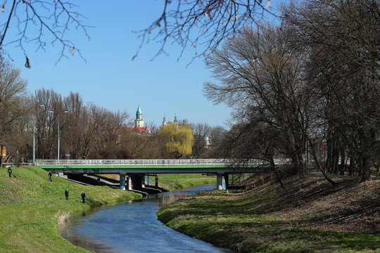 Landscape with a river and a bridge on a sunny day in the city of Lublin.