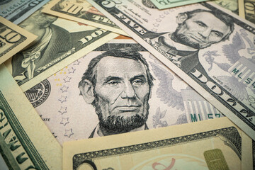 Macro shot of Lincoln portrait on a 5 US dollars banknote made in 2013.