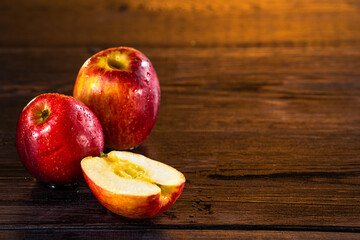 Fototapeta na wymiar Ripe red apples on a wooden background. healthy lifestyle. healthy eating. vitamins