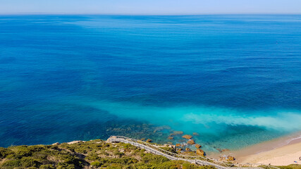 Fototapeta na wymiar Beautiful landscape. Top view to amazing Atlantic Ocean shore. Wonderful view with azure clear water