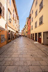 Fototapeta na wymiar Narrow shopping street in the historic heart of Rovinj