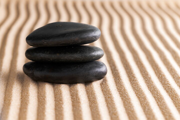 Fototapeta na wymiar Japanese zen garden with stone in raked sand
