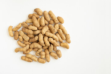 peanuts or groundnuts in shells, isolated on white background