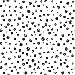 Seamless pattern of black circles. A seamless pattern made with hand drawn circles.
