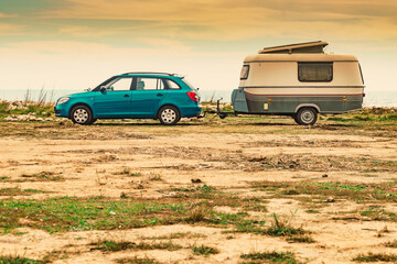 Obraz na płótnie Canvas Caravan trailer camping on coast, Spain.