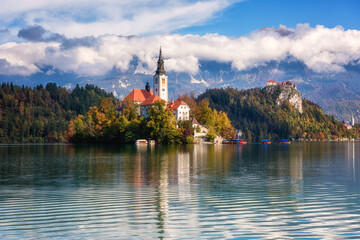 Famous alpine Bled lake (Blejsko jezero) in Slovenia, amazing autumn landscape. Scenic view of the...