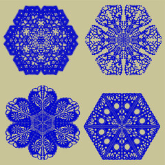 Collection of blue silhouettes of snowflakes on a beige background. Winter composition. Christmas, New Year. - obrazy, fototapety, plakaty