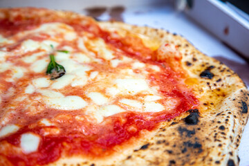 Pizza Margherita close up. Pizza napoletana from Naples, Italy.