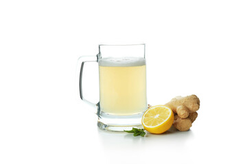 Glass of ginger beer and ingredient isolated on white
