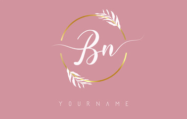 BN b n Letters logo design with golden circle and white leaves on branches around. Vector Illustration with B and N letters.
