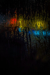 window texture with raindrops with night environment and city light