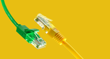 Ethernet cables with RJ45 plug on yellow background - obrazy, fototapety, plakaty