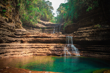 The majestic Wei Sawdong waterfalls in Meghalaya during summer. A 3 tier waterfall.
