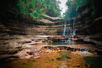 The majestic Wei Sawdong waterfalls in Meghalaya during summer. A 3 tier waterfall.