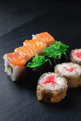 Classic sushi rolls on a dark background