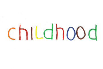 word childhood made of colored plasticine isolated on white
