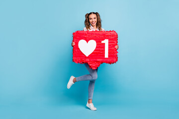Full length body size view of fun cheerful girl holding in hands sign thumbup approve isolated on...