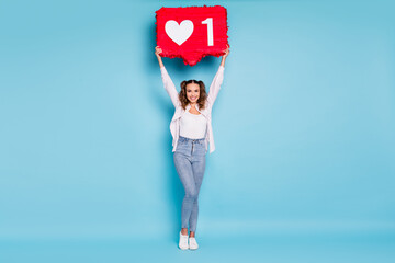 Full length body size view of lovely cheerful girl holding in hands sign thumb up approve isolated...