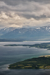 Scenic view of the beautiful landscape of Tromso from the top of a mountain, with a beautiful light