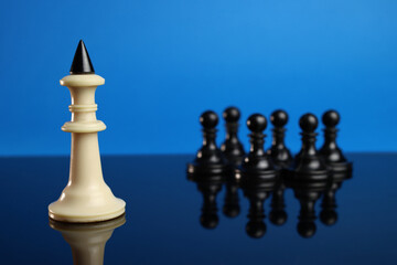 king chess leads the other pieces. The concept of leadership. Low depth of field