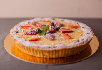 Cottage cheese pie, decorated with berries.