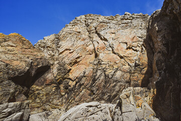 .Rocky ocean coast in France, beautiful rock blocks.