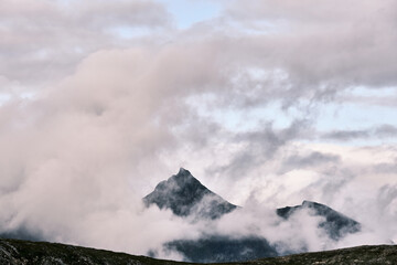 Scenic view of  clouds and mountains near Tromso