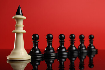 chess king-leader leads the pawn team to the goal, success. Leadership concept