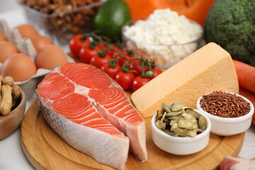 Composition with healthy food on white table. Keto diet