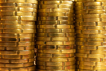 Close up view of three coin towers.. Coin texture. Save money concept banner