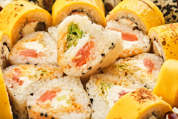 Assortment Sushi Roll Set, top view, close-up. Hosomaki, uramaki, gunkan.