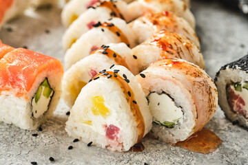 Sushi rolls close-up, Sushi with salmon and philadelphia cheese