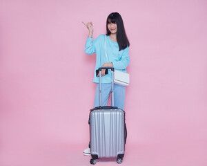 Woman with suitcase. Vacation travel