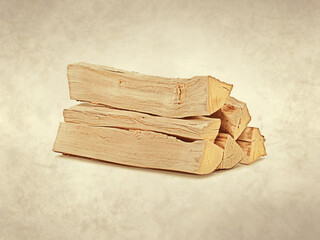 Pile of beech tree firewood on old paper background