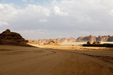 Typical landscape with eroded mountains in the desert oasis of Al Ula in Saudi Arabia - 426016847