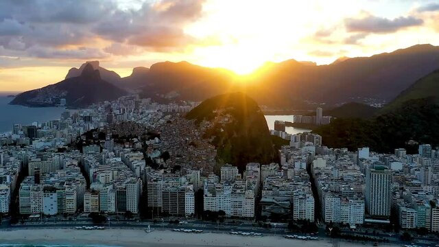 Sunset in Copacabana, coastal city of Rio de Janeiro, Brazil.Sugarloaf mountain view.Sunset in Copacabana, coastal city of Rio de Janeiro, Brazil.Sugarloaf mountain view.Sunset in Copacabana.