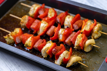 Chicken skewer with red pepper and sausage