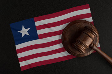 Judges gavel and the flag of Liberia. Law and Justice. Constitutional law