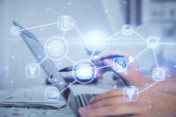 Double exposure of woman hands typing on computer and social network theme hologram drawing. People media concept.