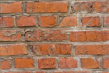 Fototapeta premium Old cracked red bricks wall texture. Stock photo.