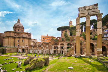 forum romanum in Rome, Italy. Temple of Saturn and Temple of Castor and Pollux, ancient ruins of the Roman Forum. Travel and vacation in Italy