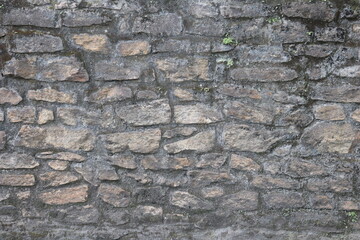 Historic wall made of old and dirty stones. Could be used for wallpapers.