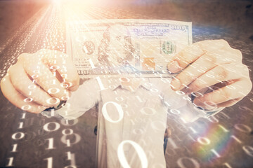 Double exposure of technology drawing hologram and us dollars bills and man hands. Data concept