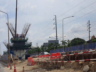 The construction of an elevated bridge to tackle the problem of traffic jams. Rama 2 Road, Bangkok, Thailand.