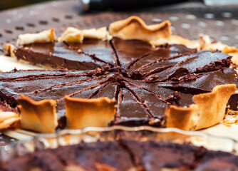 Delicious homemade cakes. Pies with chocolate and berries.