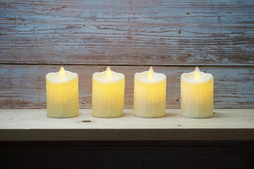 LED Candle Light electronic with space copy on wooden background