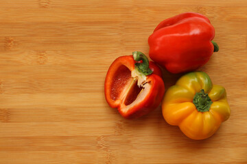 Paprika. Group pepper red and yellow pepper bell on wooden background. Sweet red peppers.
