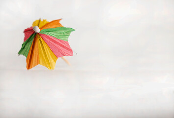 colored umbrella supported and open